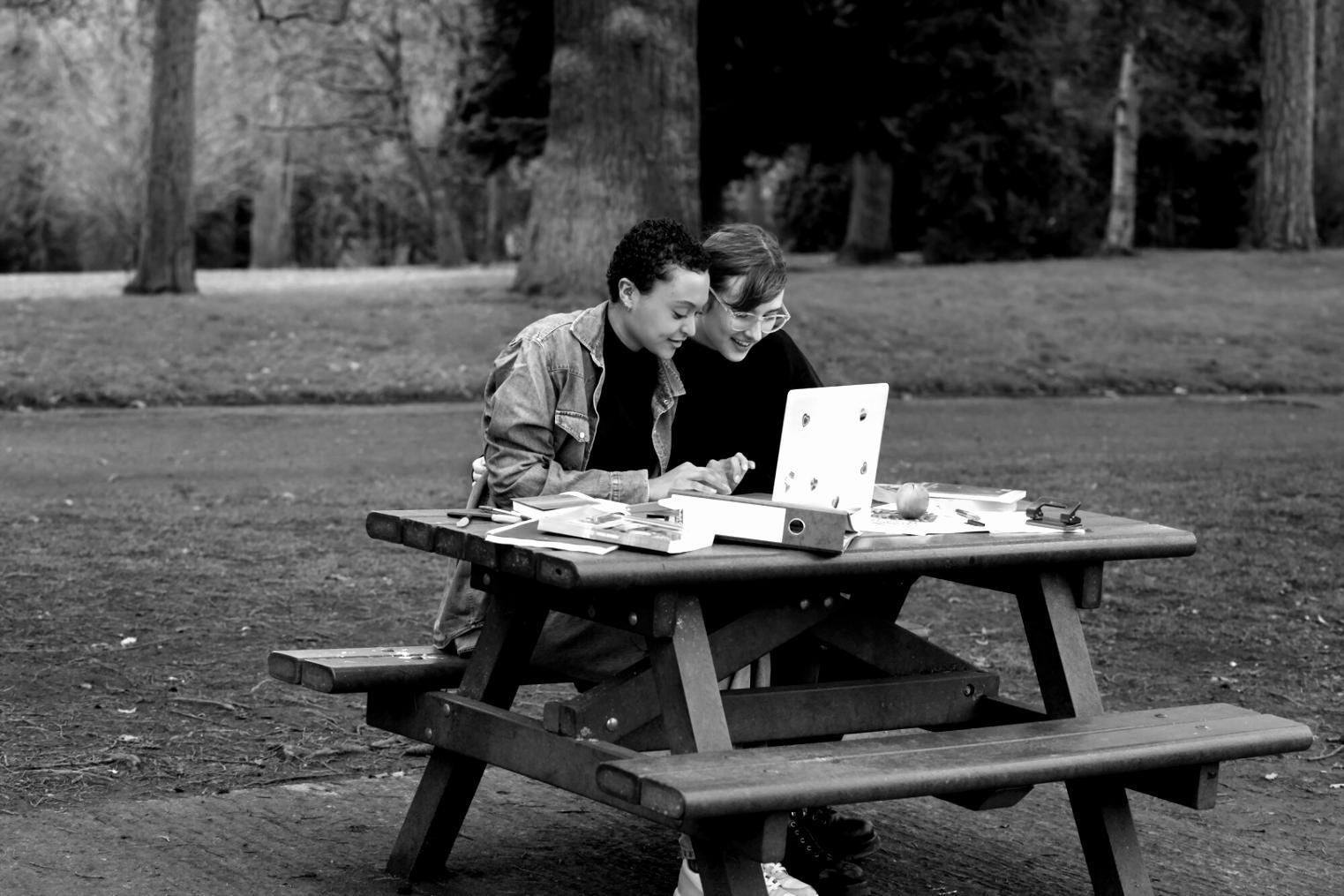 Financial planning workspace with investment documents and charts