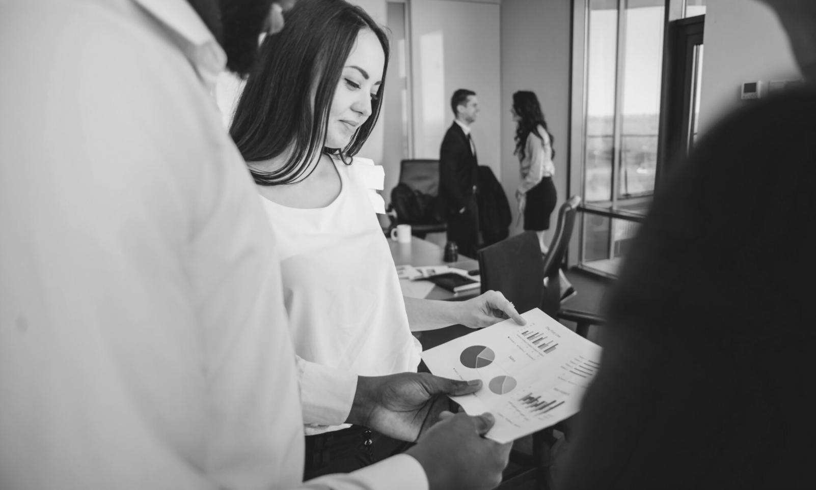 Financial planning workspace with charts and documents